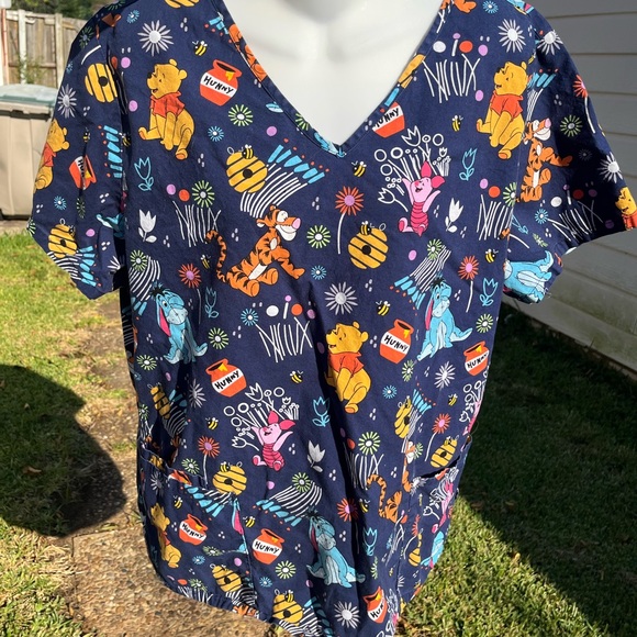 Disney women’s  Winnie the Pooh navy blue scrub top - Picture 1 of 7